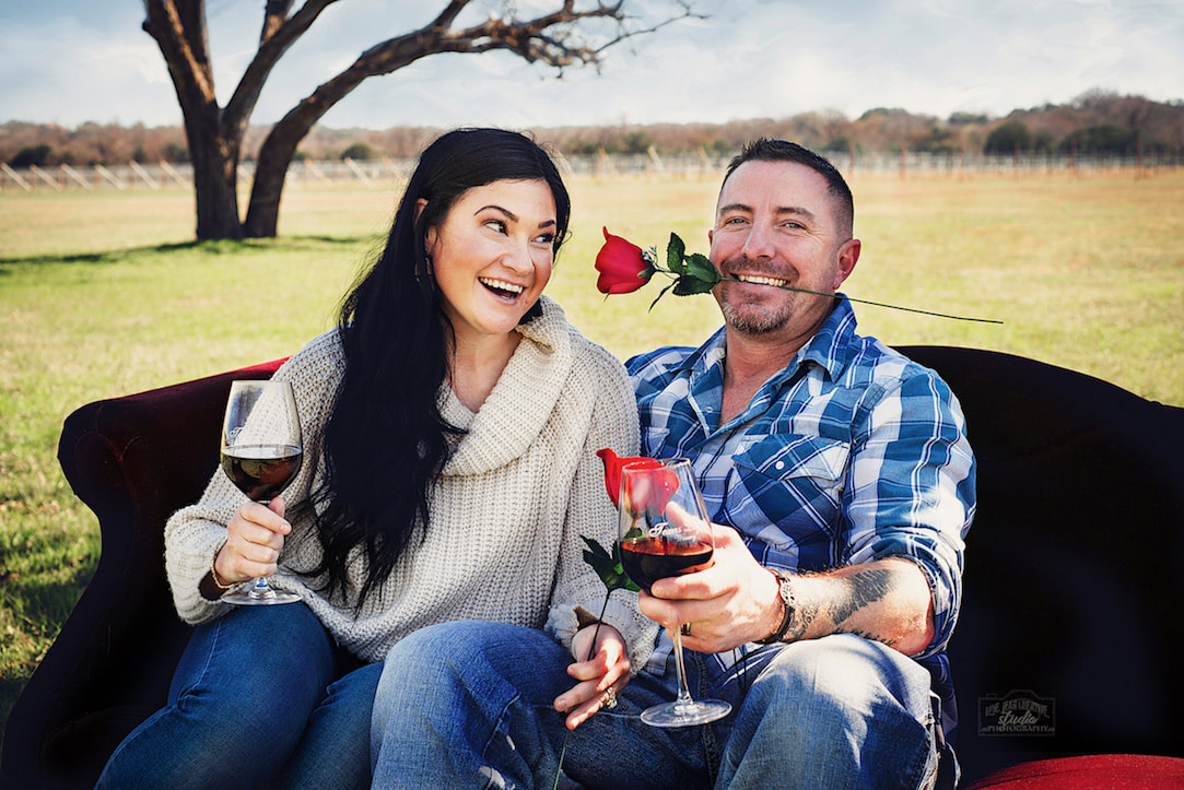 Couple with wine and roses